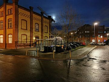 Voormalige koetsierswoning en hoofdgebouw van de W. Spindler wasserij bij nacht van Spindlersfeld in Bildern