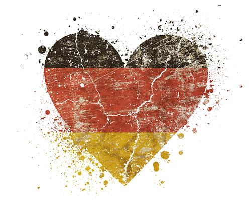Heart shaped grunge vintage faded German flag