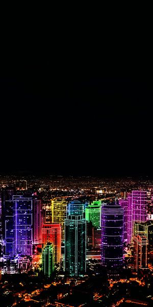 Colorful glowing skyscrapers at night by Jonas Potthast