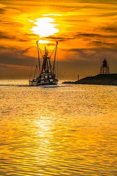 Sunset over the harbour entrance of Stavoren by Harrie Muis