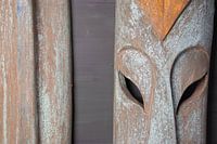 2 wooden masks