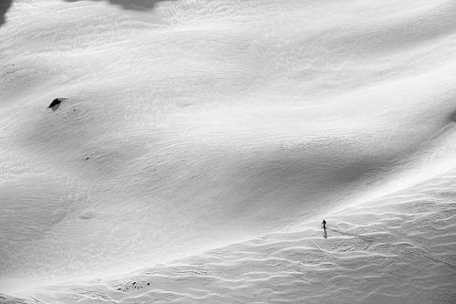 Lonely snow trip in the high mountains. Black white photography