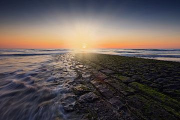 sunset behind a breakwater in the North Sea by gaps photography