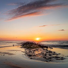 Coucher de soleil sur la plage de Texel sur Jeffrey Van Zandbeek