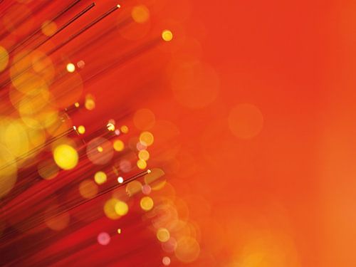 Faisceau lumineux abstrait en fibre de verre de couleur orange