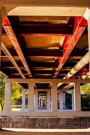 Under-Bridge Geometry — Red Steel & Concrete Rhythm by Brave Toaster Photography