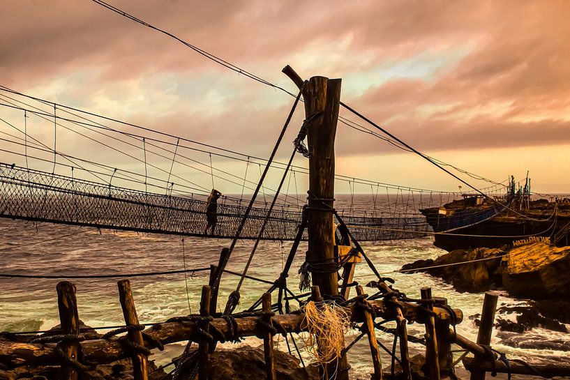 Un homme sur un pont de pied de corde oscillant. par kall3bu