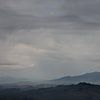 Toscaanse wolken van Guido Akster