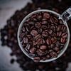 A sharp dark cup of coffee from above by nick ringelberg