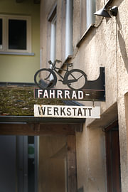 Bicycle repair shop by Heiko Kueverling