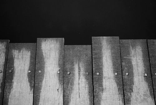 Planks of the bridge in black and white