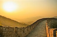 Sunset on the great wall of China, the air is saturated with smog - a red sunset by Michael Semenov thumbnail