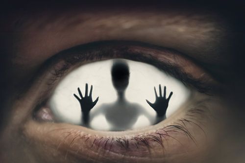 Surrealist Photo of Human Silhouette in Eye Socket - Mysticism and Symbolism by Elianne van Turennout