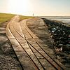 Trolley rails on the dike by Heiko Westphalen