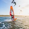 Sunset kitesurfing by Andy Troy
