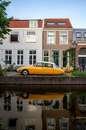 Citroën DS on the canal - classic car with reflection in the water