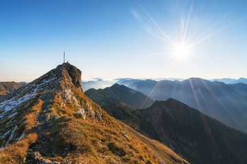 Mountain top Hochplatte at sunrise in autumn with some snow. Hiking in the Ammergau Alps