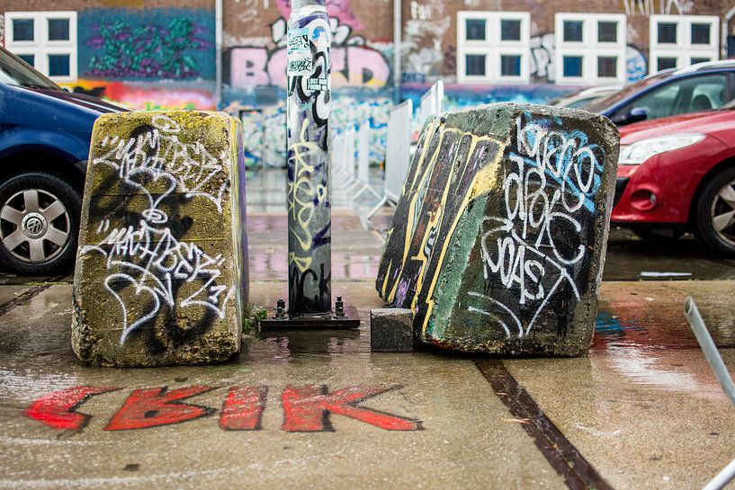 Graffiti on the parking lot at NDSM by Paul van Putten