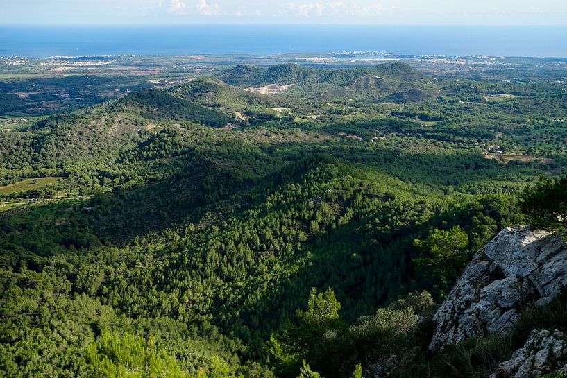 View from Sant Salvador (Mallorca) to the hilly landscape with the sea in the background by Hans-Heinrich Runge