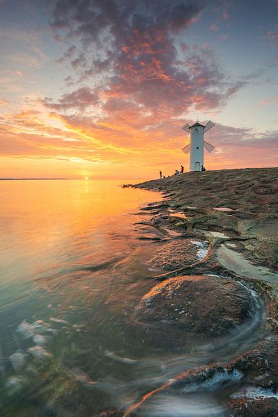 Mill beacon Swinoujscie at sunset by Robin Oelschlegel
