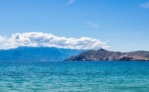 Azure sea with island on Croatian coast
