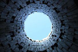 gate and trumpet in the sky. Dark tunnel and blue sky, symbol of death by Michael Semenov
