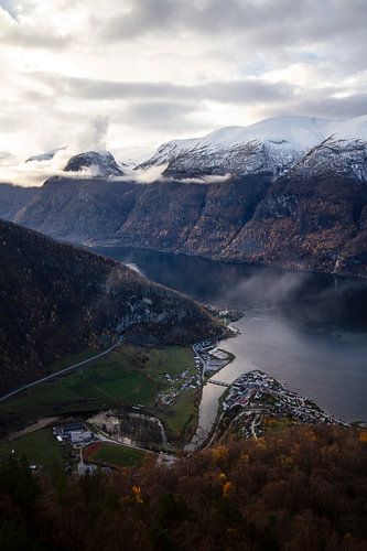 Beautiful fjord in Norway with white snowy peaks