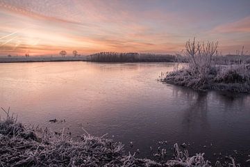 Hollandse winterse zonsopkomst van Hans Goudriaan