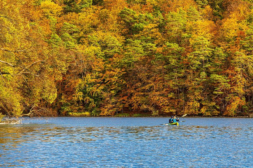 Kayaking in the lake Schmaler Luzin in the autumnal Feldberger Seenl by Rico Ködder