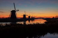 De molens van Kinderdijk bij zonsopgang van Pieter van Dieren (pidi.photo) thumbnail