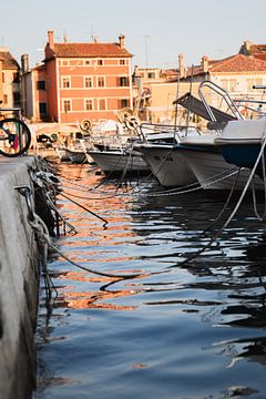 Picturesque port of Rovinj: Boats resting at the quay by thomaswphotography