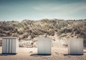 3 Strandcabines met zicht op de duinen.