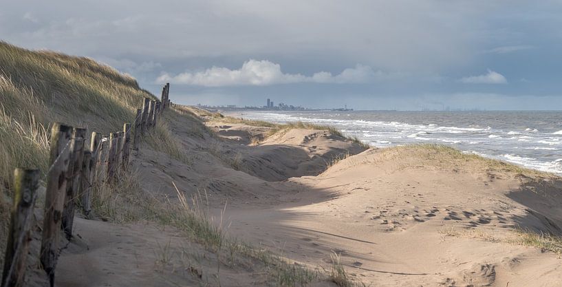 Zicht op Scheveningen bij zonopkomst van Paul Algra