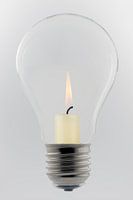 Glass lamp with candle