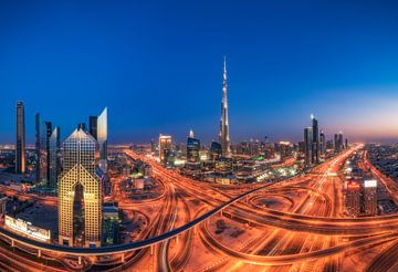 Dubai Downtown Skyline op het blauwe uur van Jean Claude Castor