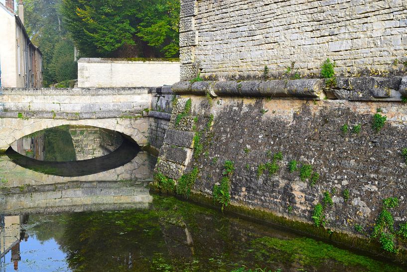 Medieval walls and bridge reflected in still water on a sunny morning in autumn by Studio LE-gals