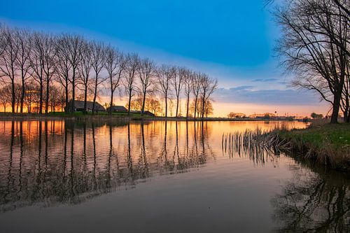 Landschapsfoto van de zonsondergang bij Kampereiland in de IJsseldelta