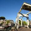 De Magere Brug over de Amstel in Amsterdam van Merijn van der Vliet