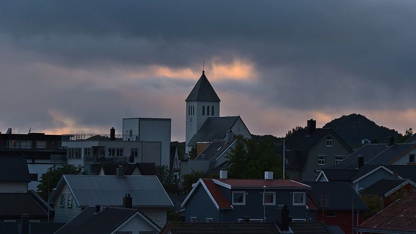 View over the roofs of Svolvær, Lofoten, Norway at dusk by Timon Schneider