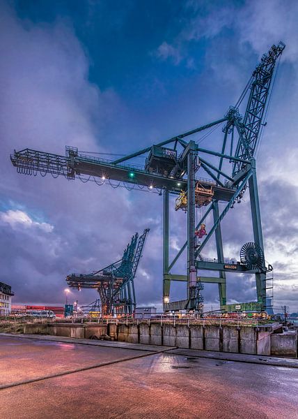 Twilight scene with container crane against dramatic sky, Antwerp  by Tony Vingerhoets