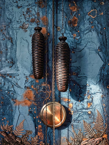 Black Forest cuckoo clock pendulum in detail