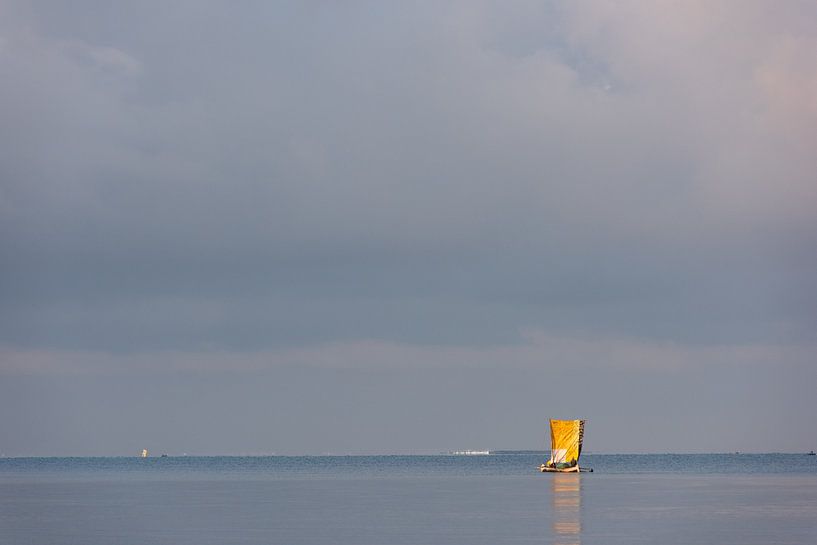 Sailboat heading for the coral reef in Ifaty, Madagascar by Felix Sedney