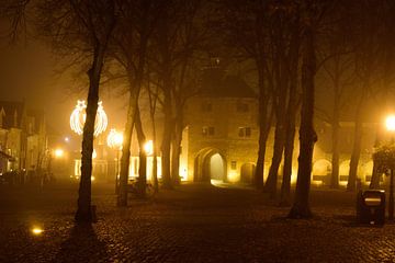 The Vischpoort of Harderwijk in the fog by Gerard de Zwaan