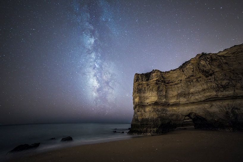 Milky way above the beach and the sea in the Algarve, Portugal by Hidde Hageman