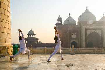 Yoga in the early morning at the Taj Mahal by Martijn