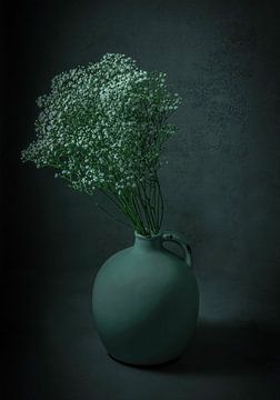 Still life gypsophila in early dew vase