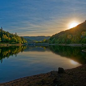 Setting sun over an alpine lake by BHotography