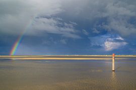 Rainbow at the beach on Texel island in the Wadden sea region by Sjoerd van der Wal Photography