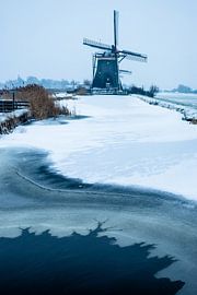Mill on a frozen ditch by Gijs Verbeek