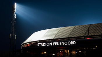 De Kuip stadium illuminated in the evening